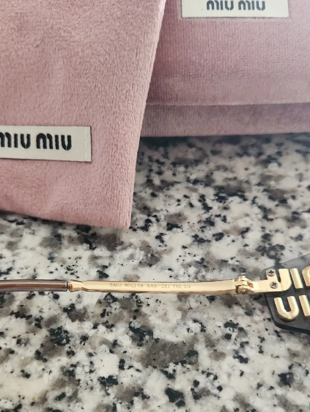 Miu Miu Gold and Black Rimless Sunglasses with Pink Velvet Case